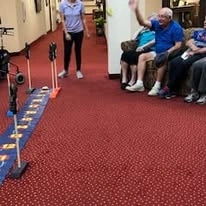 Heatherwood Gracious Retirement Living Hawthorn Senior Independent Living in Tewksbury, Massachusetts residents playing a competitive game