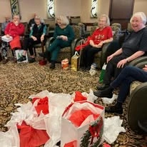The Stafford Senior Living in Lake Oswego, Oregon residents at a white elephant gift exchange party