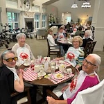 The Savoy Gracious Retirement Living Hawthorn Senior Independent Living in Winter Springs, Florida residents eating dinner