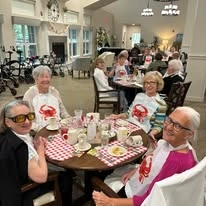 The Savoy Gracious Retirement Living Hawthorn Senior Independent Living in Winter Springs, Florida residents eating dinner