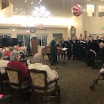 Pioneer Valley Lodge Gracious Retirement Living Hawthorn Senior Independent Living in North Logan, Utah residents being sang to