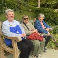Azalea Estates Gracious Retirement Living Hawthorn Senior Independent Living in Chapel Hill, North Carolina residents socializing on a bench outside