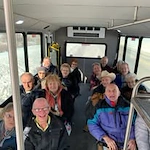 Pioneer Valley Lodge Gracious Retirement Living Hawthorn Senior Independent Living in North Logan, Utah residents on the transportation bus
