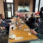 American House Farmington Hills, senior living community offering independent living, assisted living, memory care, and respite care in Farmington Hills, MI, residents enjoying a meal together