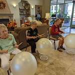 The Peaks At Santa Rita Active Retirement Living Hawthorn Senior Independent Living in Green Valley, Arizona residents playing drums