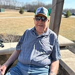 Astral at Auburn, senior living community offering independent living, assisted living, and memory care in Auburn, IN, happy resident outside