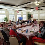 Maple Ridge Gracious Retirement Living Hawthorn Senior Independent Living in Cedar Park, Texas residents at a Christmas cookie decorating party
