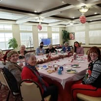 Maple Ridge Gracious Retirement Living Hawthorn Senior Independent Living in Cedar Park, Texas residents at a Christmas cookie decorating party