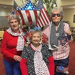 Cypress Springs Gracious Retirement Living Hawthorn Senior Independent Living in Lakewood Ranch, Florida residents at 4th of July party