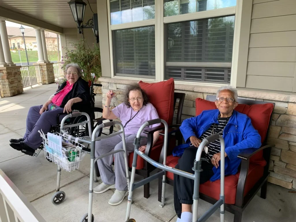 Beachwood Commons by New Perspective in Beachwood, OH, smiling residents enjoying the outdoors
