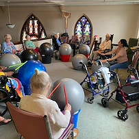 Prime Healthcare Senior Living – Fox Knoll Village in Aurora, IL, residents having fun staying active