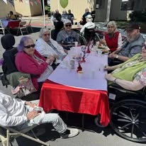 Avamere at Park Place Assisted Senior Living in Tigard, Oregon, residents enjoying time together outside