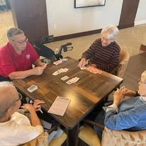 Ovation Heartwood Preserve Senior Living in Omaha, Nebraska residents playing cards