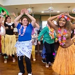 Leis, Dancing, and Hawaiian Food Make Vineyard Place's Luau a Success!