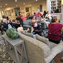 Sonata Coconut Creek seniors watching a show together