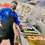 chef making food at Salmon Creek Gracious Retirement Living Hawthorn Senior Independent Living in Boise, Idaho