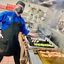 chef making food at Salmon Creek Gracious Retirement Living Hawthorn Senior Independent Living in Boise, Idaho
