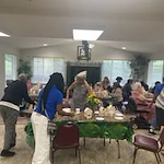 Shads Landing Gracious Retirement Living Hawthorn Senior Independent Living in Charlotte, North Carolina residents at a party