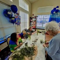 Ashwood Meadows Independent Living Hawthorn Senior Living in Johns Creek, Georgia residents gardening