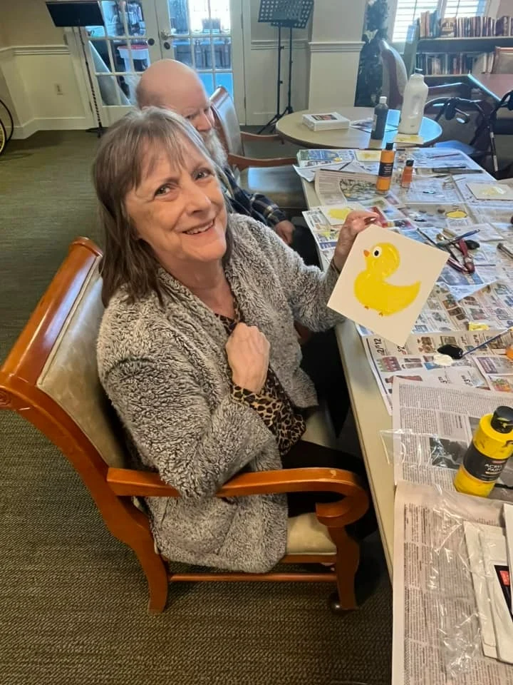 Charter Senior Living of Fredericksburg, Virginia, resident embracing creativity through an art project