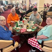Fairview Estates Gracious Retirement Living Hawthorn Senior Independent Living in Hopkinton, Massachusetts residents at a dinner party