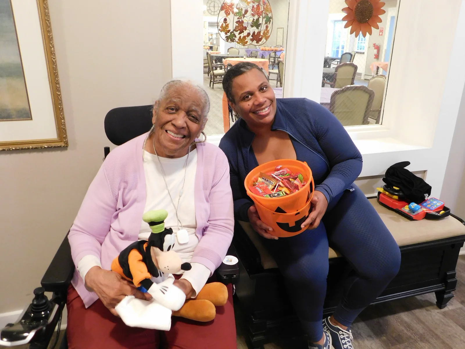 American House Dearborn Heights, senior living community offering independent living and respite care in Dearborn Heights, MI, resident and staff member on Halloween