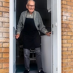 Man answering front door