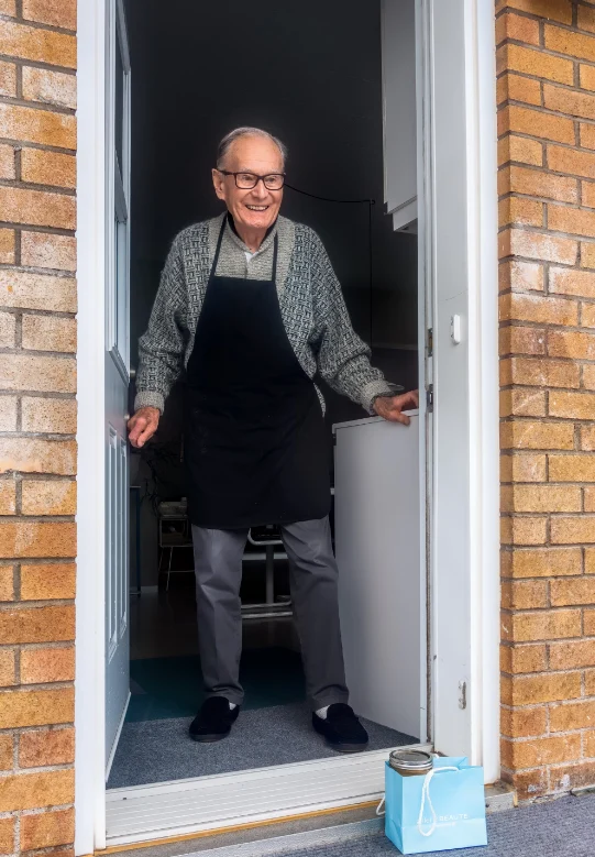 Man answering front door