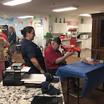 Colonial Harbor Gracious Retirement Living Hawthorn Senior Independent Living in Yorktown, Virginia resident shooting a nerf gun