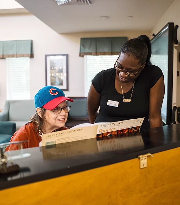 Concord Place Senior Memory Care in Knoxville, TN resident playing piano