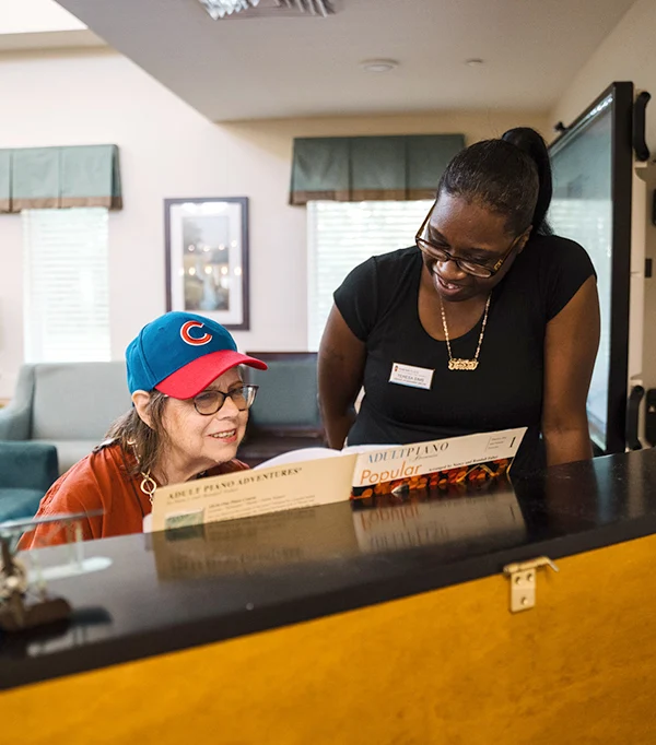 Concord Place Senior Memory Care in Knoxville, TN resident playing piano