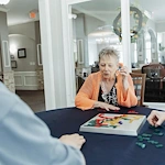 Residents playing word game