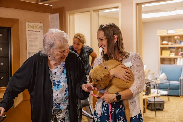 Vineyard Park of Port Orchard resident enjoys visit from therapy dog