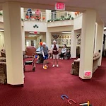 The Palms At La Quinta Gracious Retirement Living Hawthorn Senior Independent Living in La Quinta, California residents playing a game of horseshoes