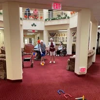 The Palms At La Quinta Gracious Retirement Living Hawthorn Senior Independent Living in La Quinta, California residents playing a game of horseshoes