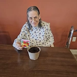 Residents of Broadwell Senior Living at Plymouth planted flowers for National Plant a Flower Day