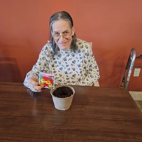 Residents of Broadwell Senior Living at Plymouth planted flowers for National Plant a Flower Day