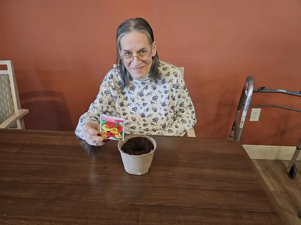 Residents of Broadwell Senior Living at Plymouth planted flowers for National Plant a Flower Day