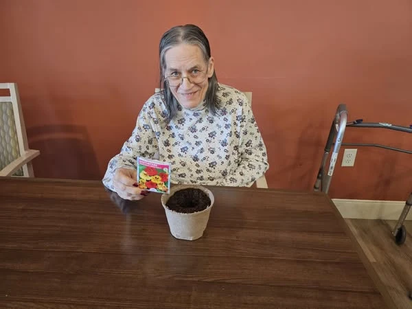 Residents of Broadwell Senior Living at Plymouth planted flowers for National Plant a Flower Day