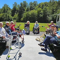 Charter Senior Living of Fredericksburg, Virginia, residents socializing outside