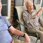 Melrose Meadows residents relaxing on the patio