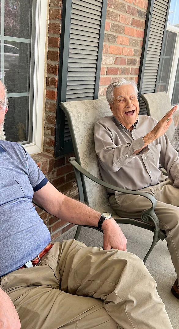 Melrose Meadows residents relaxing on the patio