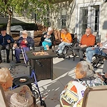 Sage Independence sitting around a firepit