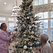 Wilshire Estates Gracious Retirement Living Hawthorn Senior Independent Living in Silver Spring, Maryland residents decorating the Christmas tree