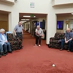 Somerset Lodge Gracious Retirement Living Hawthorn Senior Independent Living in Gladstone, Oregon residents indoor bowling