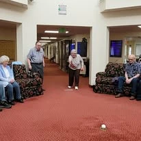 Somerset Lodge Gracious Retirement Living Hawthorn Senior Independent Living in Gladstone, Oregon residents indoor bowling