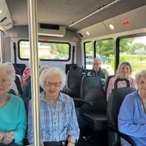 The Arbor at Avamere Court Assisted Senior Living in Keizer, Oregon residents on a transportation bus