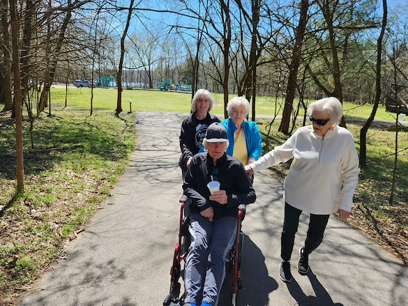 Charter Senior Living of Gallatin, Tennessee, residents on a walk outside