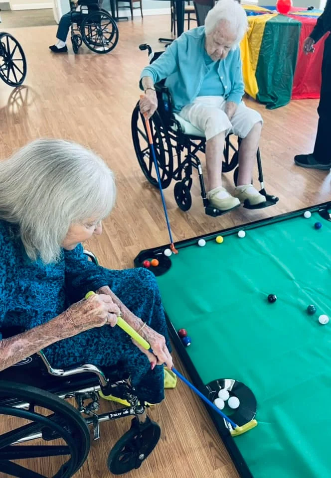 Hidden Lakes Senior Living Community Vero Beach, FL, residents enjoying a fun activity