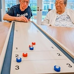 The Knolls Of Oxford residents playing a game together